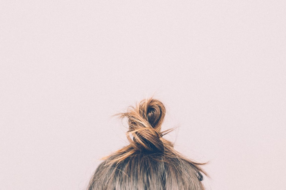 Hair in a bun to test what bioresonance therapy is