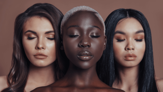 three women of mixed race that have healthy skin