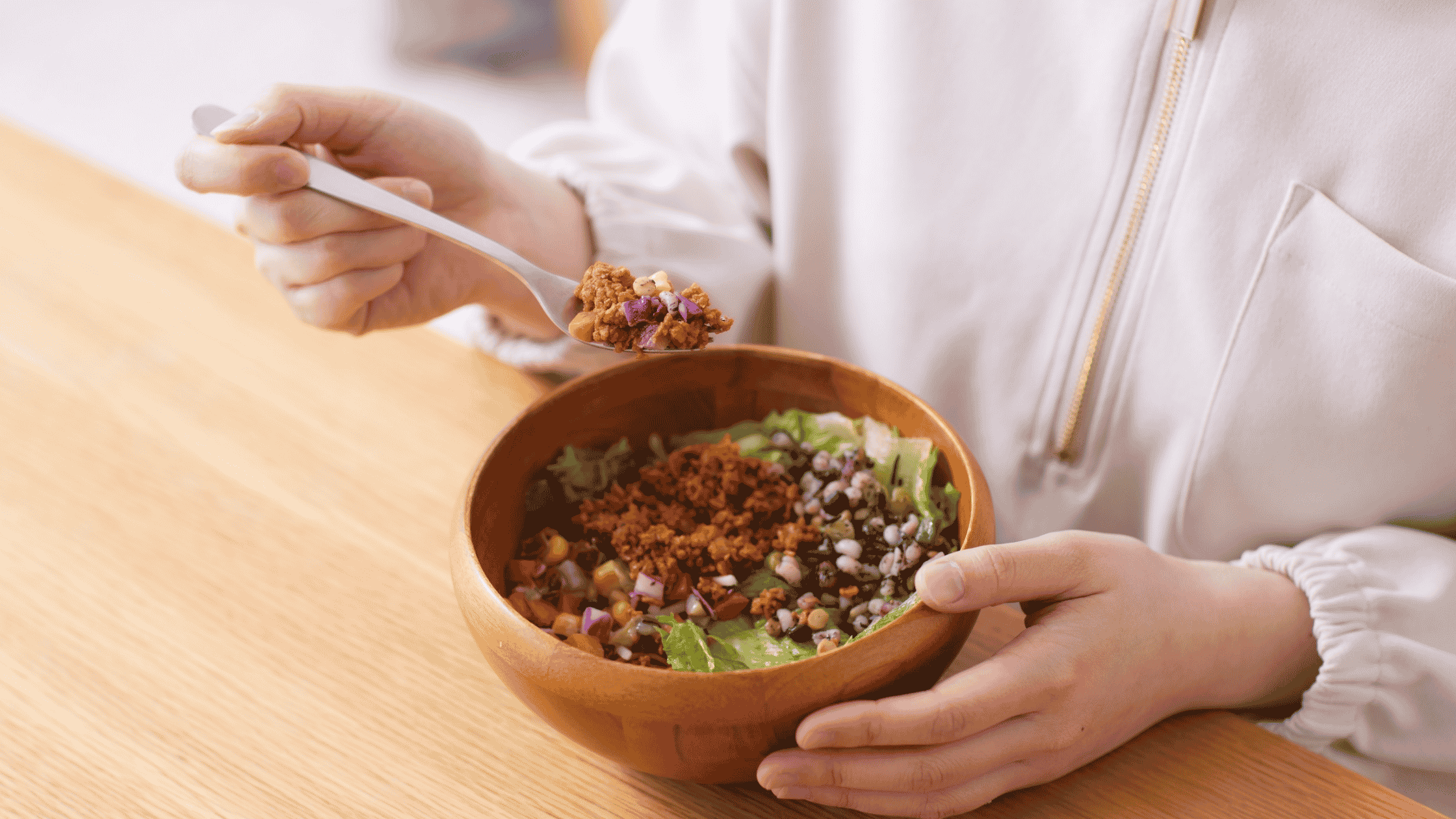 Top 10 CCK-boosting foods including wild-caught salmon, eggs, grass-fed beef, artichokes, olive oil, lentils, and nuts to naturally increase satiety hormone levels