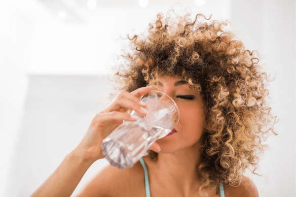 Woman drinking a glass of water