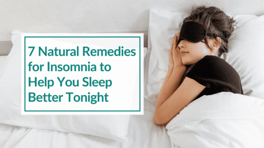 Woman in a black tee shirt and a back eye mask sleeping amongst white sheets. Text Overlay: 7 Natural Remedies for Insomnia to Help You Sleep Better Tonight