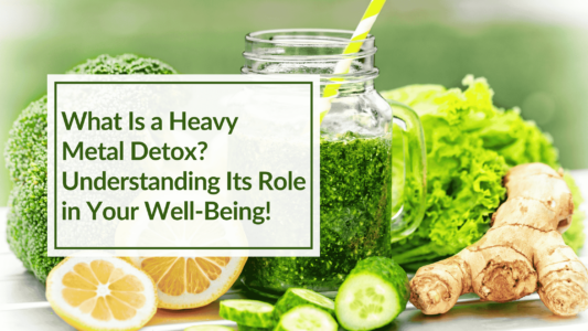 A green smoothie surrounded by cucumber, ginger, lemon and greens. Overlay text: What Is a Heavy Metal Detox? Designed to help describe what are heavy metal toxins.