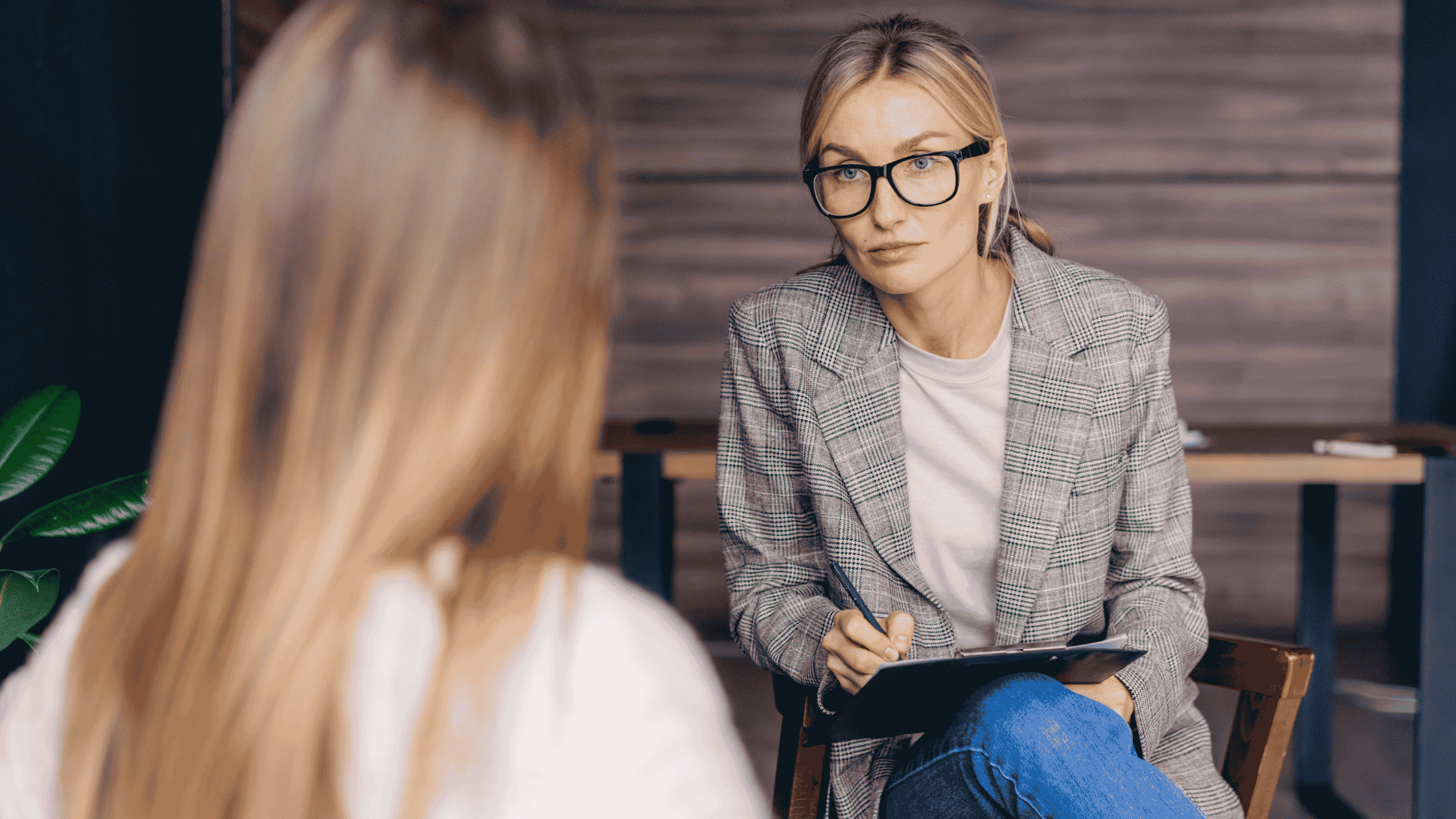 a wellness practitioner talking to client.
