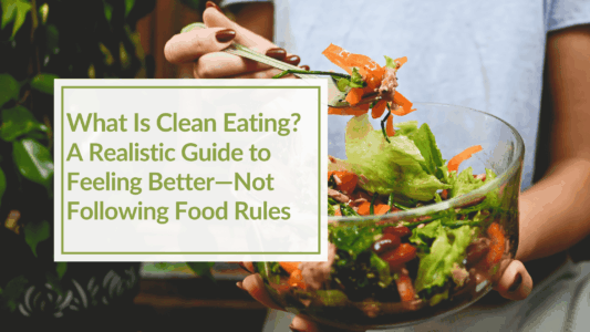 A close up of a large bowl of salad that a person is holding. Overlay text: What Is Clean Eating? A Realistic Guide to Feeling Better—Not Following Food Rules