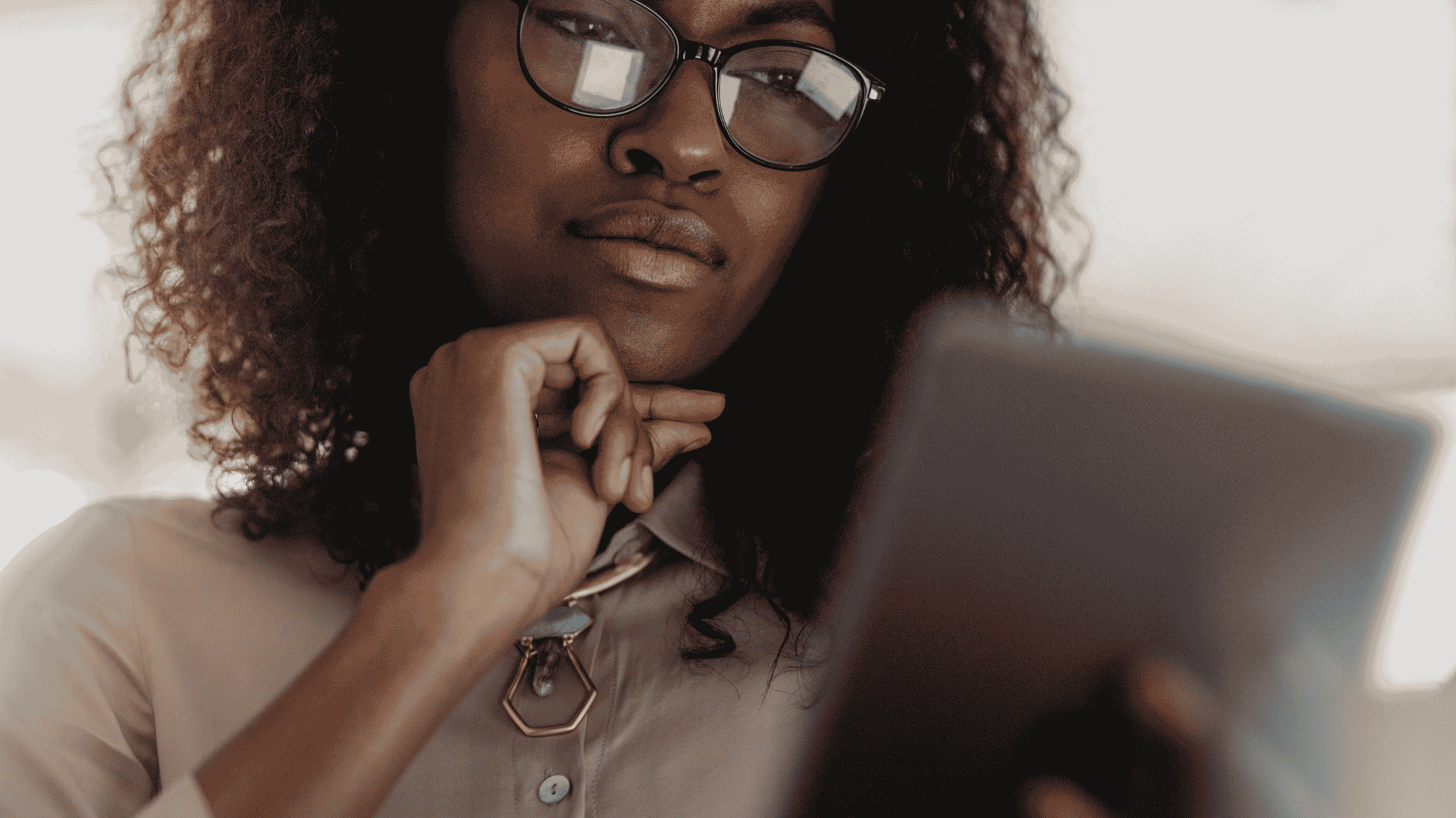 woman looking at a tablet