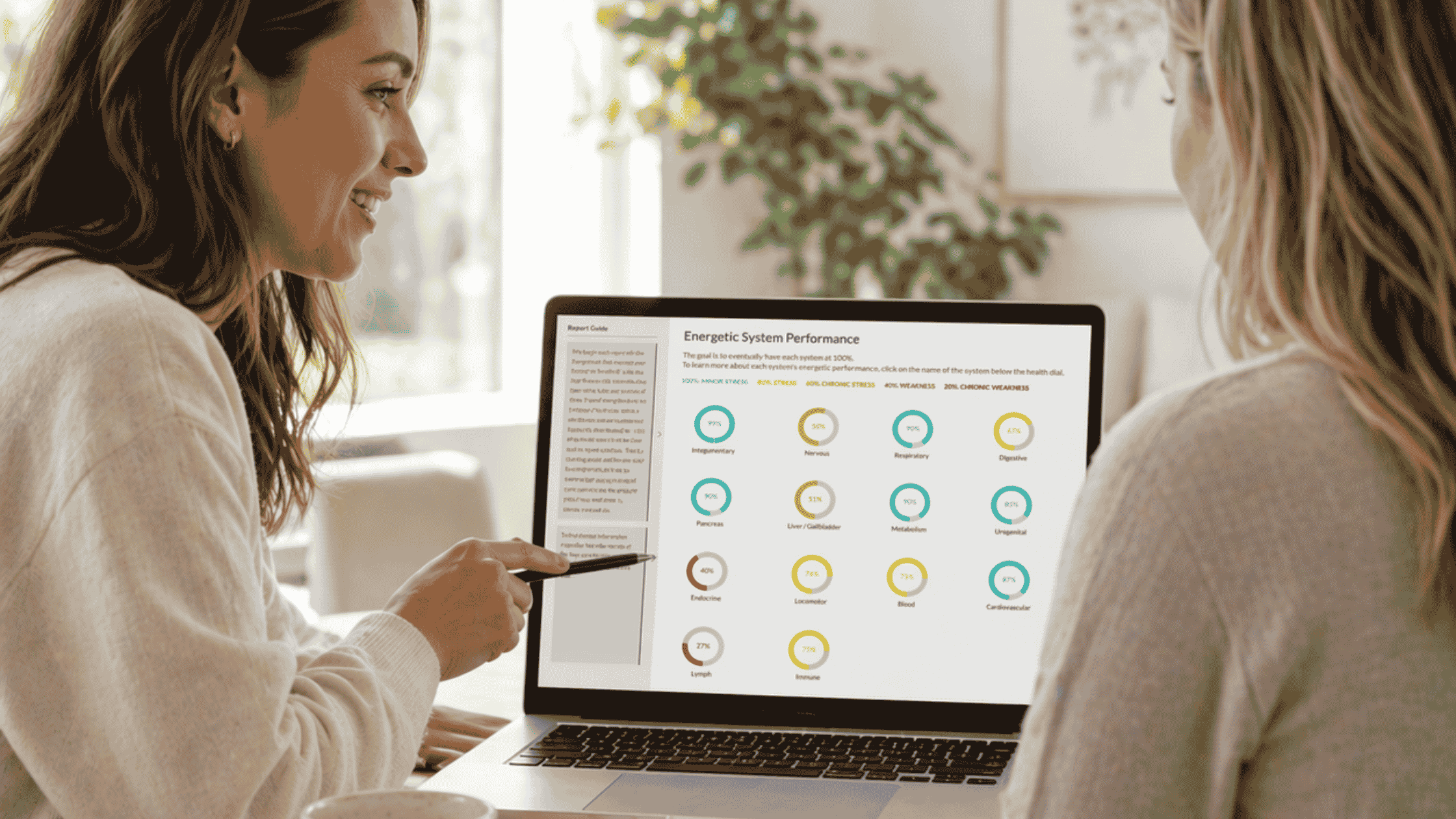 practitioner showing client a CBH Energetics report.